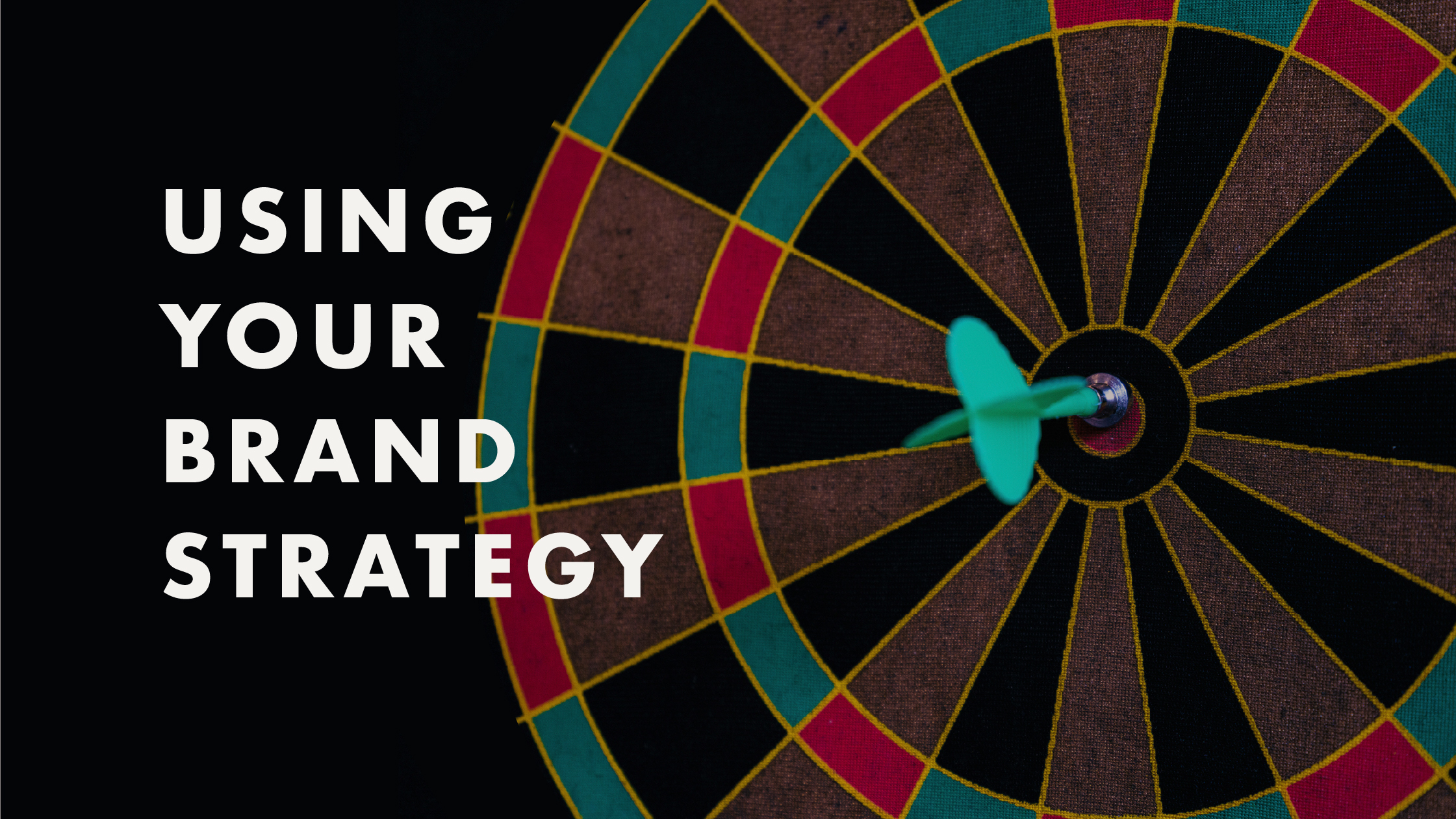 A dart board next to text that reads: "Using Your Brand Strategy."
